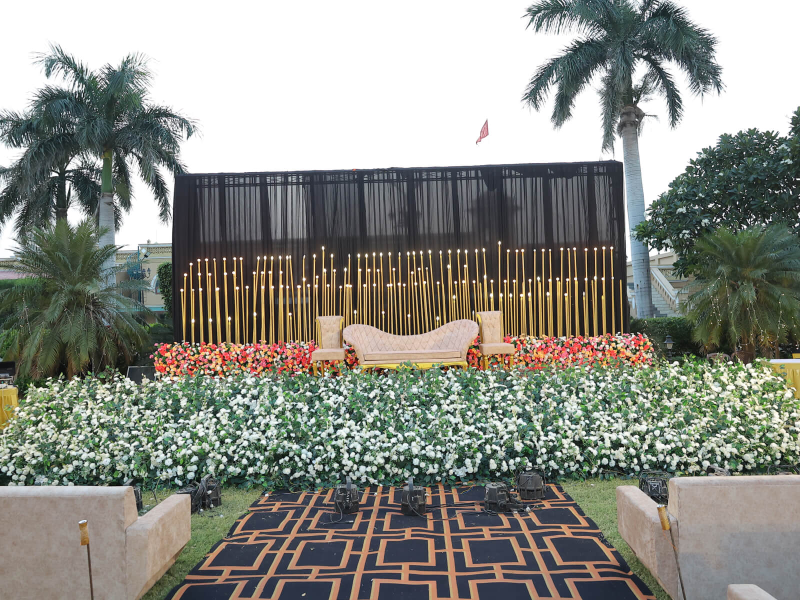 outdoor wedding reception with floral arrangements and elegant decor