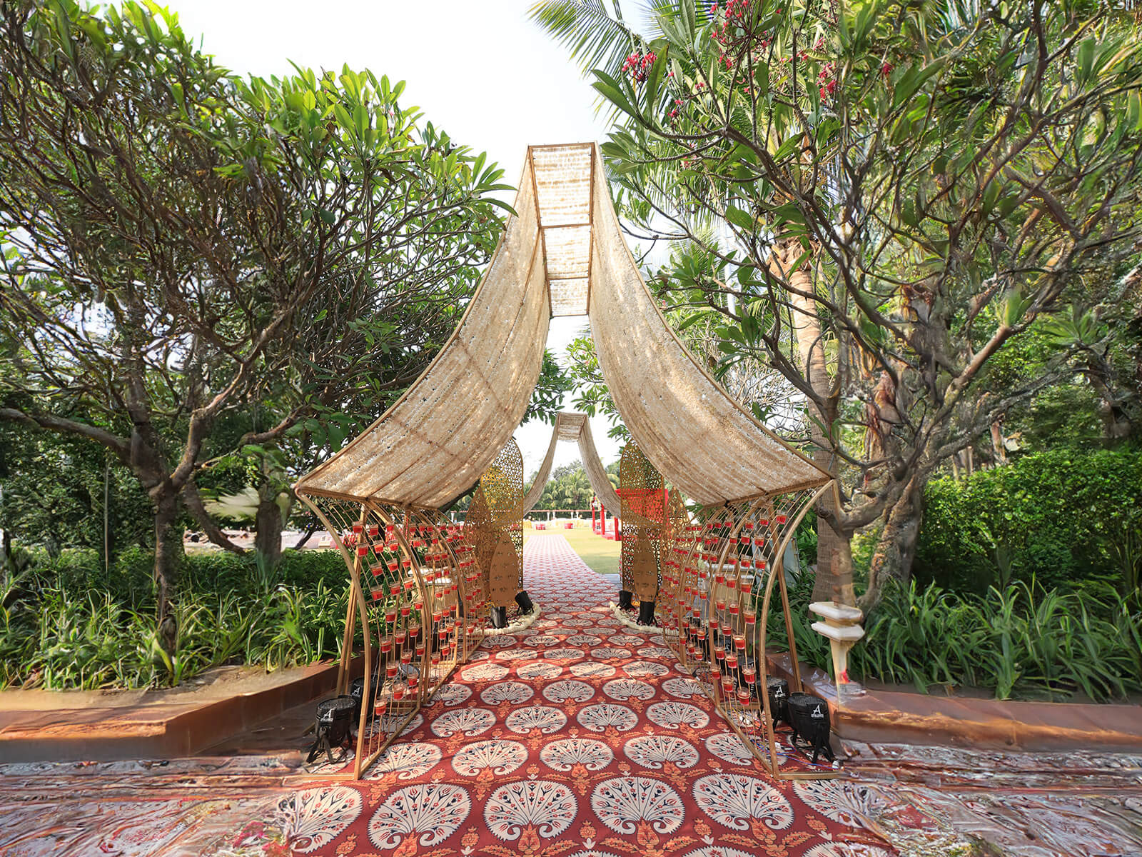 Outdoor wedding event decoration with elegant canopy and floral arrangements, perfect for destination weddings and event planning